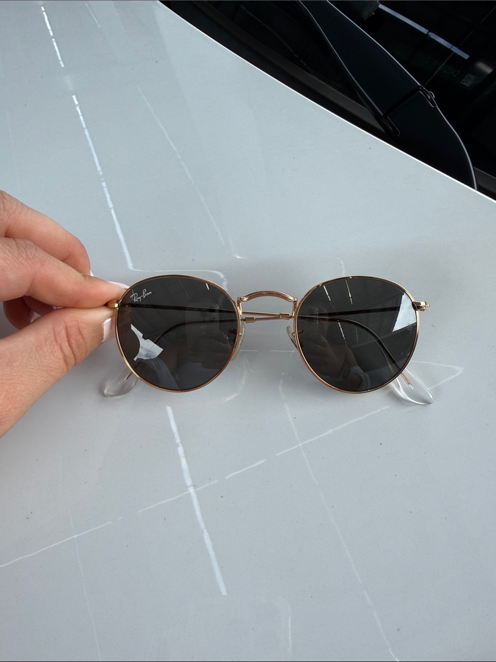 Ray-Ban Rose Gold Frame Sunglasses with Black Lenses..